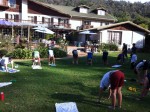 The riders learning the yoga 'down dog' pose